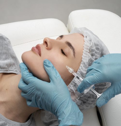 high-angle-woman-getting-injection
